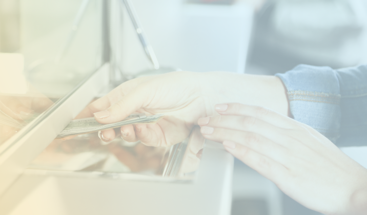 Woman depositing money at a bank