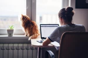 Woman works from home on laptop